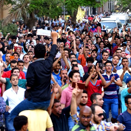 Egyptian protesters chant slogans during a demonstration in Cairo on April 25, 2016, against the handing over of two Red Sea islands to Saudi Arabia.Egyptian police fired tear gas at protesters in the Egyptian capital who defied government warnings and held a rally calling for the "downfall" of the regime, quickly scattering them and making arrests. / AFP / MOHAMED EL-SHAHED (Photo credit should read MOHAMED EL-SHAHED/AFP/Getty Images)