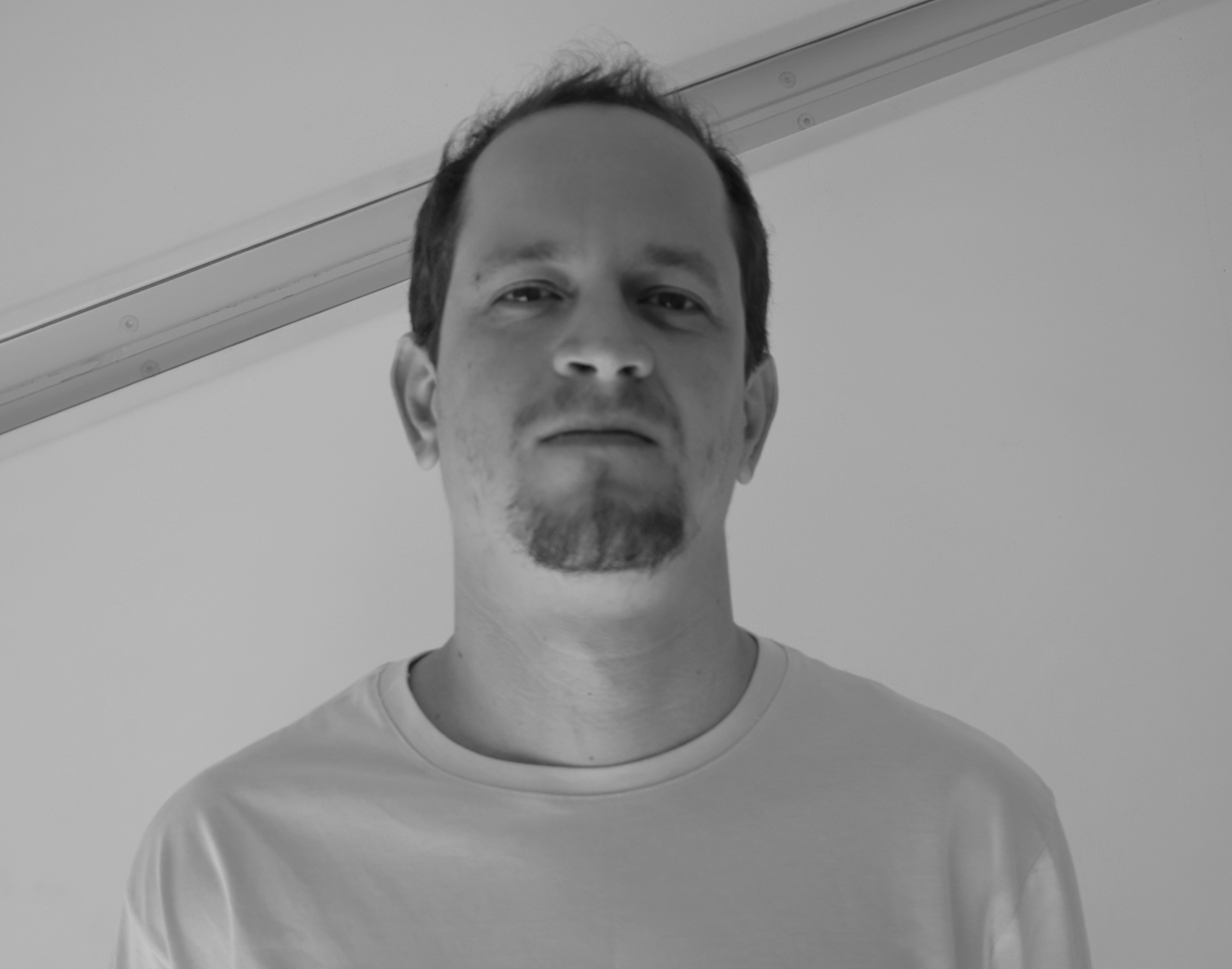 Head shot of Adriano Belisário