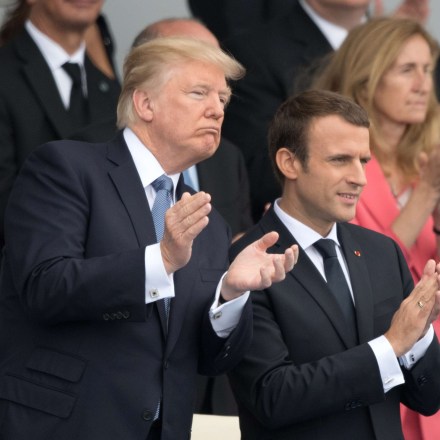 French President Emmanuel Macron and U.S. President Donald Trump attend the traditional Bastille Day military parade on the Champs-Elysees in Paris, France, July 14, 2017. President Trump and the first lady are in France to attend the Bastille day celebrations (Sipa via AP Images)