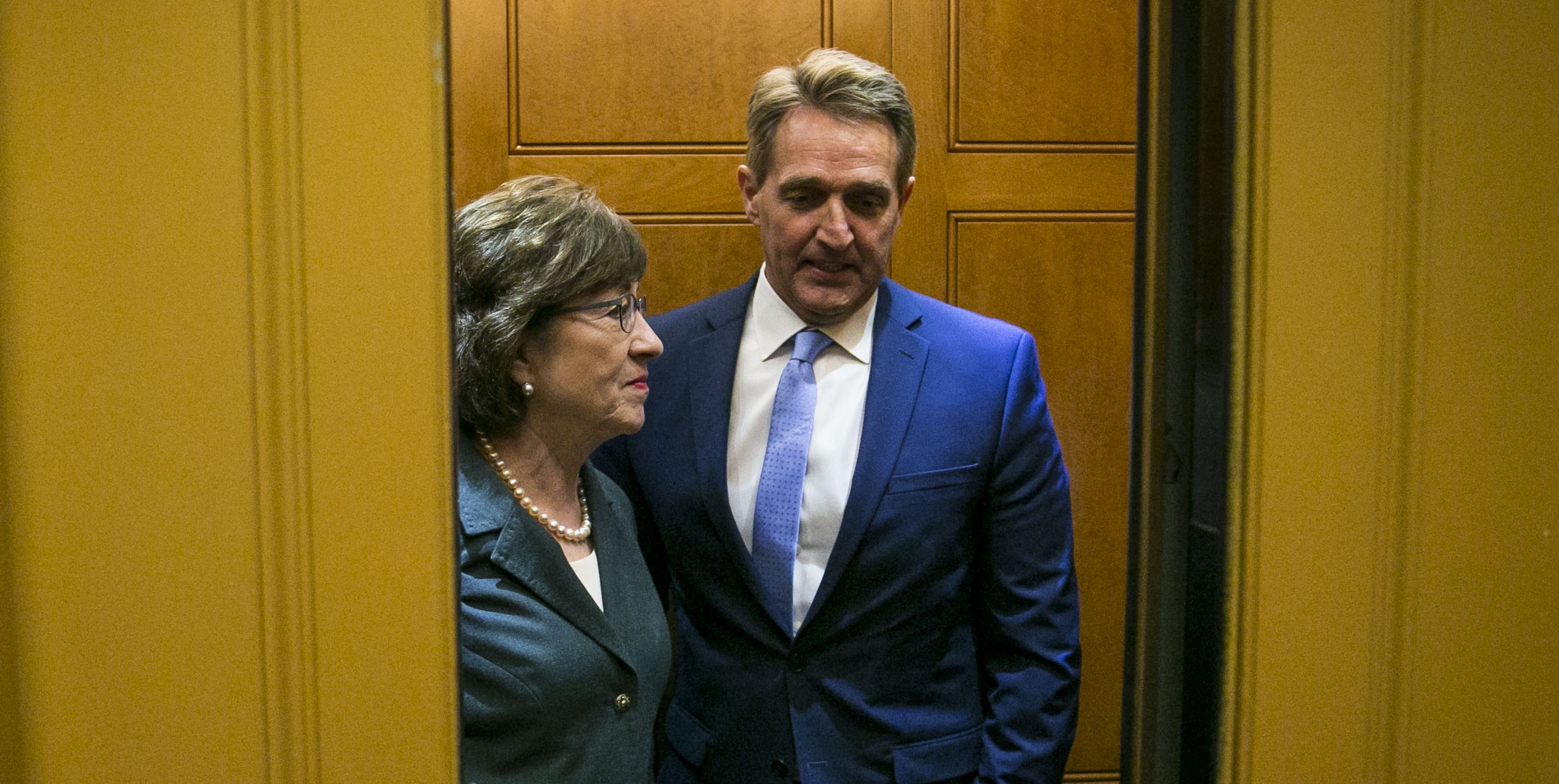 WASHINGTON, DC - DECEMBER 12:  U.S. Sen. Susan Collins (R-ME) and Sen. Jeff Flake (R-AZ) arrive for the weekly Senate Republican's policy luncheon, on Capitol Hill, December 12, 2017 in Washington, DC. (Photo by Al Drago/Getty Images)