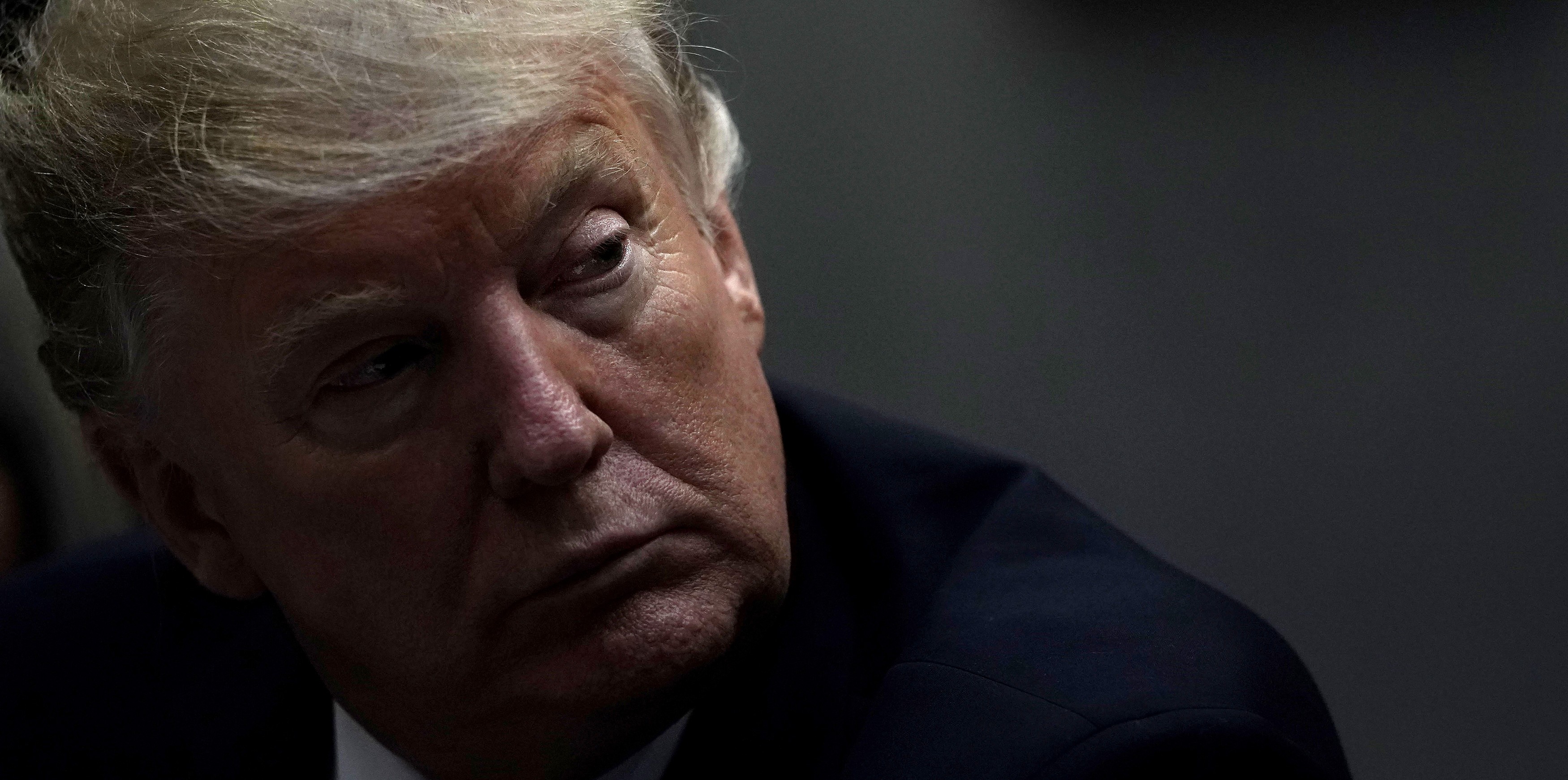 WASHINGTON, DC - JANUARY 25:   U.S. President Donald Trump listens during a meeting with Hispanic pastors at the Roosevelt Room of the White House January 25, 2019 in Washington, DC. President Trump held a roundtable with Hispanic pastors to discuss border security and economy.  (Photo by Alex Wong/Getty Images)