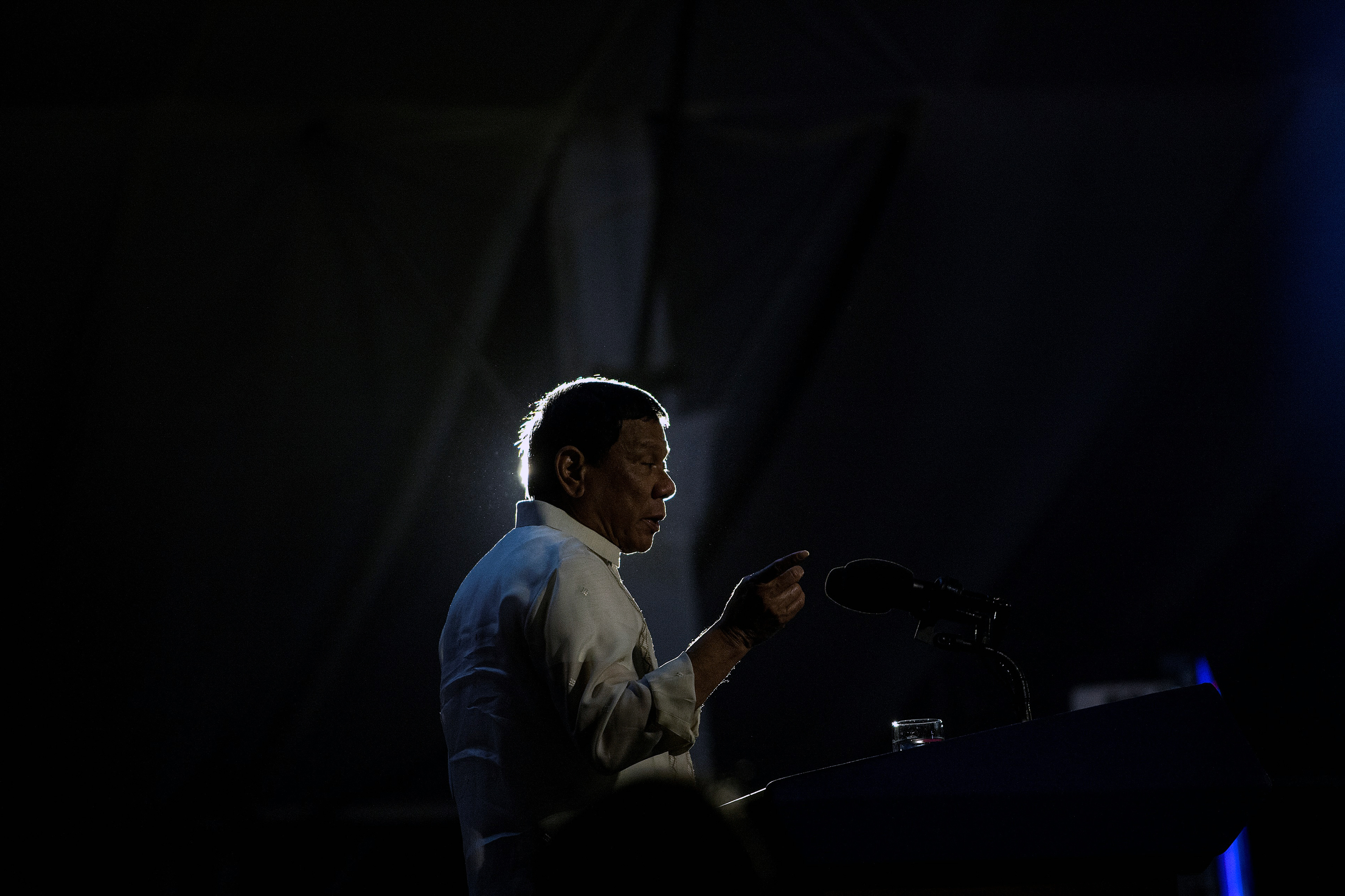 Philippine President Rodrigo Duterte delivers a speech during the "Digong's Day for Women" event on March 31, 2017.  Philippine President Rodrigo Duterte on March 30 described two major media outlets as "sons of whores" and warned them of karmic repercussions for their critical coverage of his deadly drug war. / AFP PHOTO / NOEL CELIS        (Photo credit should read NOEL CELIS/AFP/Getty Images)