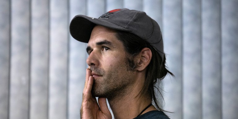 AJO, ARIZONA - MAY 10: Scott Warren, a volunteer for the humanitarian aid organization No More Deaths attends a community meeting to discuss federal charges against him for aiding undocumented immigrants on May 10, 2019 in Ajo, Arizona. Warren is scheduled to appear in court on felony charges on May 29 in Tucson, accused by the U.S. government on two counts of harboring and one count of conspiracy for providing food, water, and beds to two Central American immigrants in January, 2018. If found guilty Warren could face up to 20 years in prison. The trial is seen as a watershed case by the Trump Administration, as it pressures humanitarian organizations working to reduce suffering and deaths of immigrants along the border. The government says the aid encourages human smuggling. In a separate misdemeanor case, federal prosecutors have charged Warren with public littering, for distributing food and water along migrant trails. (Photo by John Moore/Getty Images)