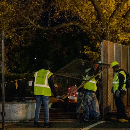 Workers erect barriers in an expanded permitter around the White House the night before the presidential election on November 2, 2020 in Washington, DC.