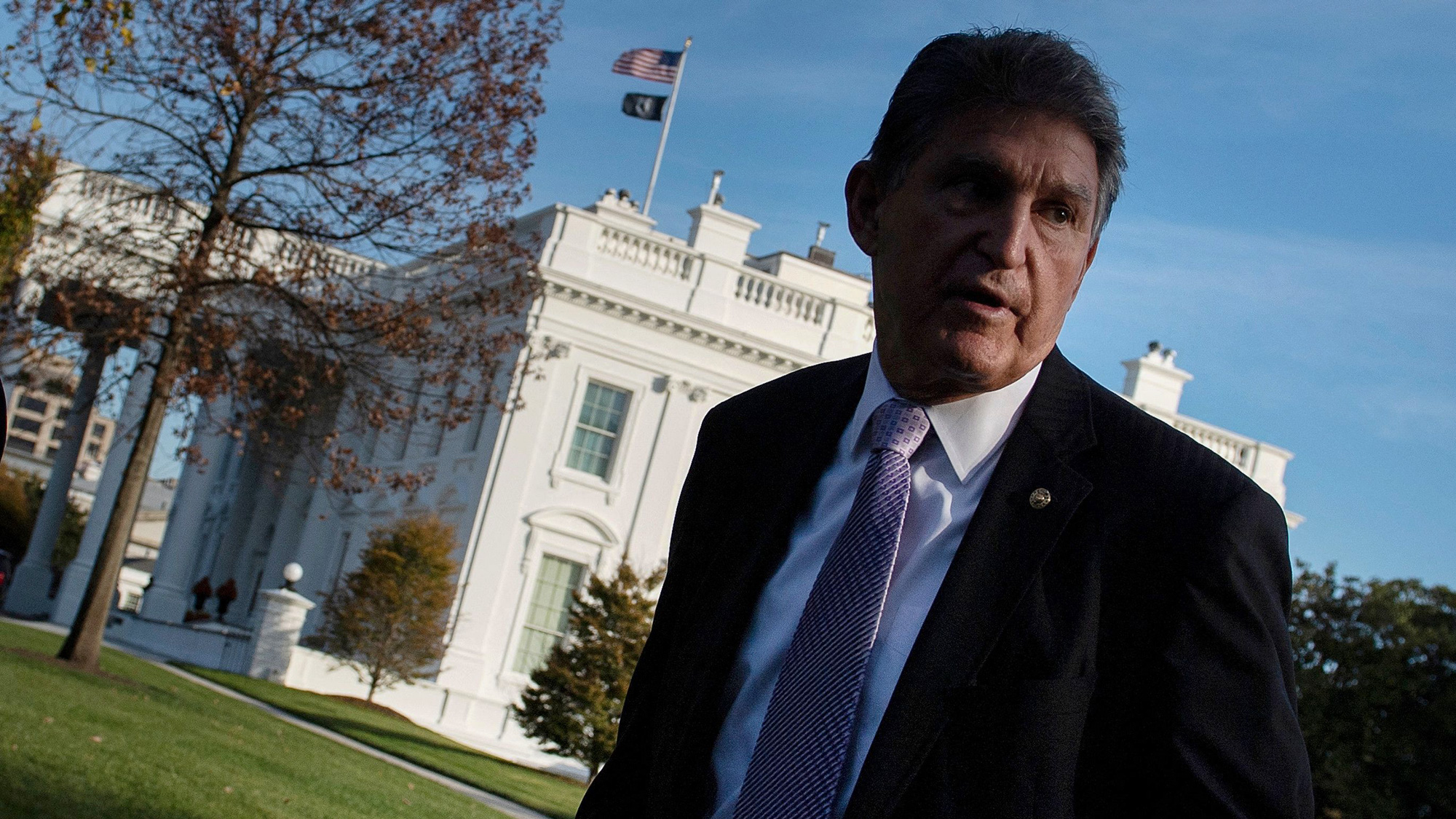 US Senator Joe Manchin III (D-WV) walks the grounds of the White House, November 18, 2021, in Washington, DC. (Photo by Brendan Smialowski / AFP) (Photo by BRENDAN SMIALOWSKI/AFP via Getty Images)