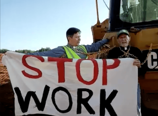 Cop City RICO Charges: Protesters Chain Themselves to Bulldozer