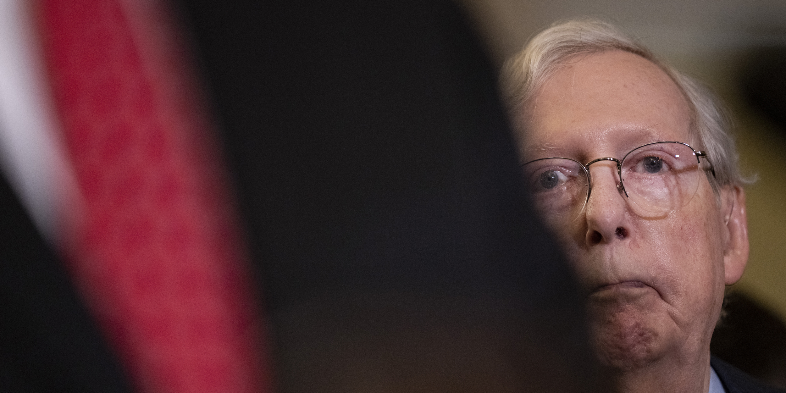 WASHINGTON, DC - JULY 26: Senate Minority Leader Mitch McConnell (R-KY) looks on during a news conference after a lunch meeting with Senate Republicans U.S. Capitol 26, 2023 in Washington, DC. McConnell froze and stopped talking at the microphone and was escorted back to his office. He later returned to the news conference and answered questions. (Photo by Drew Angerer/Getty Images)