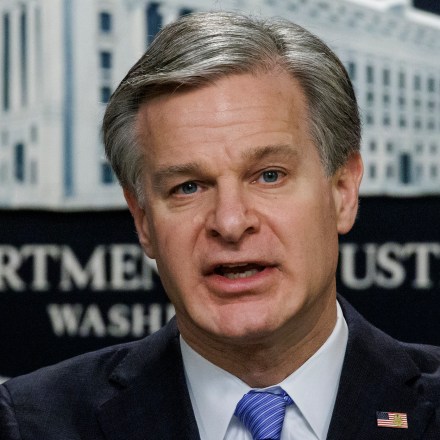 WASHINGTON, DC - DECEMBER 6: FBI Director Christopher Wray speaks during a press conference at the U.S. Department of Justice on December 6, 2023 in Washington, DC. The Department of Justice announced today that four Russian military personnel have been indicted for war crimes committed against a U.S. national living in Ukraine, the first of such charges ever to be brought under the U.S. war crimes statute. (Photo by Samuel Corum/Getty Images)