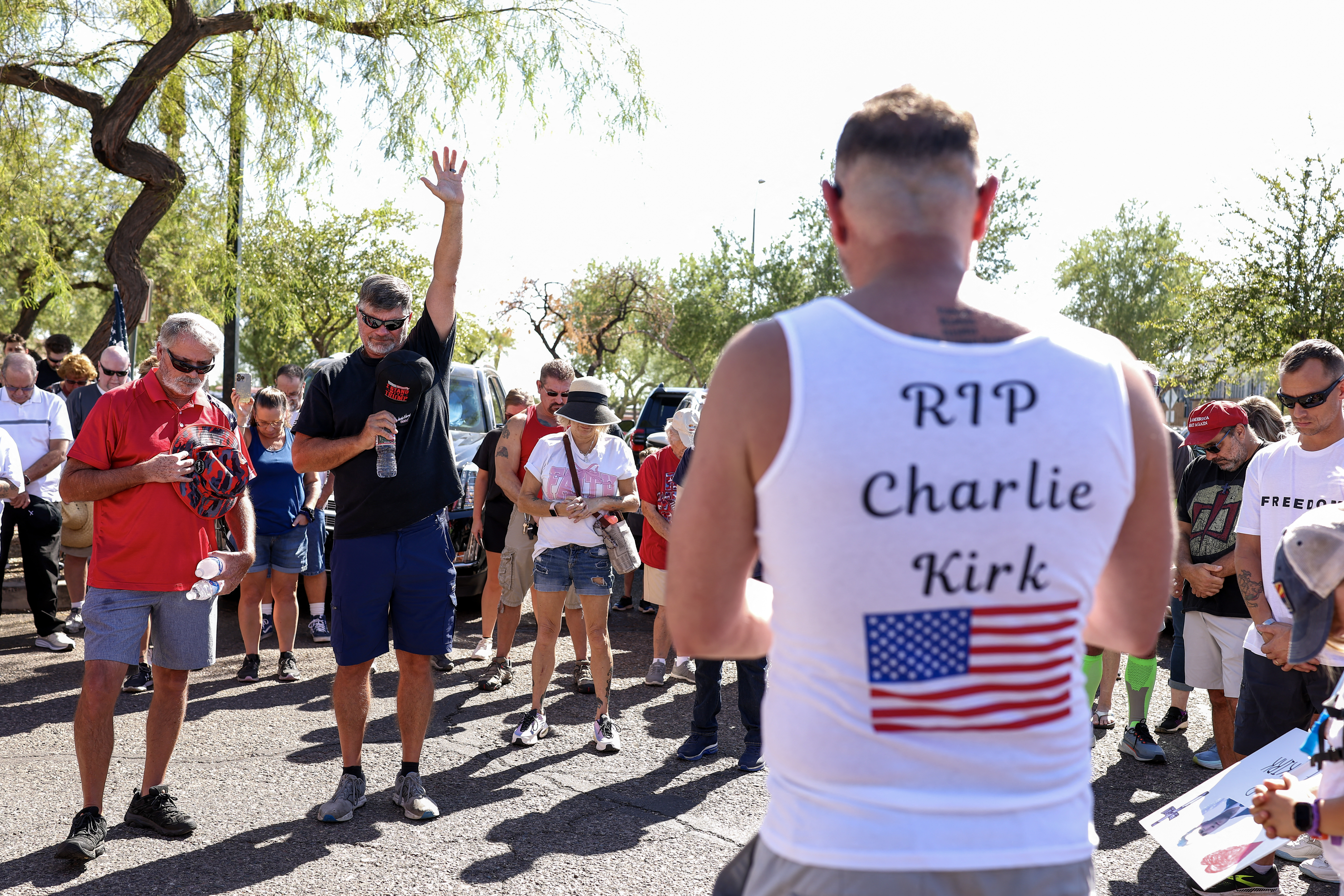People gather before marching in memory of Charlie Kirk in Peoria, Arizona, on September 13, 2025. The widow of prominent right-wing activist Charlie Kirk pledged on September 12 to carry on her husband's work, after US authorities announced his alleged assassin had finally been captured. The 31-year-old Kirk was hit by a single bullet while addressing a large crowd at Utah Valley University in the town of Orem on September 10. (Photo by CHARLY TRIBALLEAU / AFP) (Photo by CHARLY TRIBALLEAU/AFP via Getty Images)