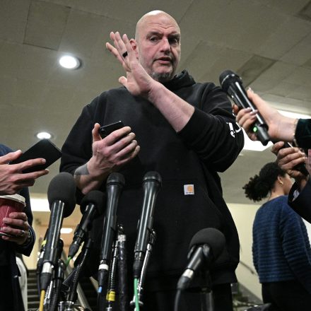 Senator John Fetterman (D-PA) speaks to the press after a briefing with US Secretary of State Marco Rubio, US Secretary of Defense Pete Hegseth, Central Intelligence Agency director John Ratliffe and Joint Chiefs of Staff Chairman General Dan Caine on US military action in Iran, at the US Capitol in Washington, DC, on March 3, 2026. The United States hit hundreds of targets across Iran, and Israel expanded its bombing to Lebanon on Monday as President Donald Trump vowed to avenge the first US deaths in the war he launched to topple Tehran's ruling clerics. Iranian forces fired missiles and drones across the Middle East, killing people in Israel and the United Arab Emirates, in retaliation for the conflict that began February 28 with the death of Iran's supreme leader, Ayatollah Ali Khamenei. (Photo by Jim WATSON / AFP via Getty Images)