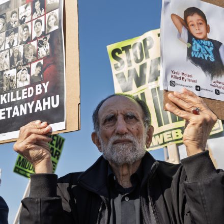 WASHINGTON, DISTICT OF COLUMBIA, UNITED STATES - 2026/03/07: A protester holds an anti-war sign while joining a demonstration outside the White House against the U.S.-Israeli attack on Iran. The joint military operation, launched on Feb. 28, reportedly killed Iran's Supreme Leader, Ayatollah Ali Khamenei. Demonstrators, some carrying Iranian flags and anti-war signs, took to the streets to voice their opposition to the strike, chanting anti-war slogans during the rally. (Photo by Probal Rashid/LightRocket via Getty Images)