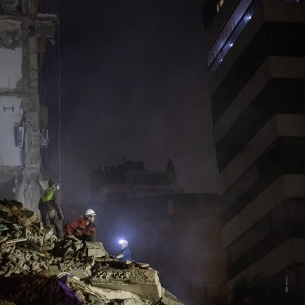 BEIRUT, LEBANON - APRIL 8: Rescue workers search the rubble for survivors and casualties after an Israeli attack targeted a residential building on April 8, 2026 in Beirut, Lebanon. Israel has stepped-up its attacks on Lebanon following President Donald Trump's announcement of a two-week ceasefire agreement between the US and Iran. Israel says it will observe the ceasefire with Iran but insists Lebanon was not included in the deal, and has since launched the "largest coordinated strike" on Hezbollah targets since the resumption of the cross-border war on March 2. Iran and Pakistan - which has been coordinating peace talks - have said that the ceasefire included Lebanon, while US President Donald Trump has said Lebanon is a "separate skirmish," and not part of the deal. (Photo by Daniel Carde/Getty Images)