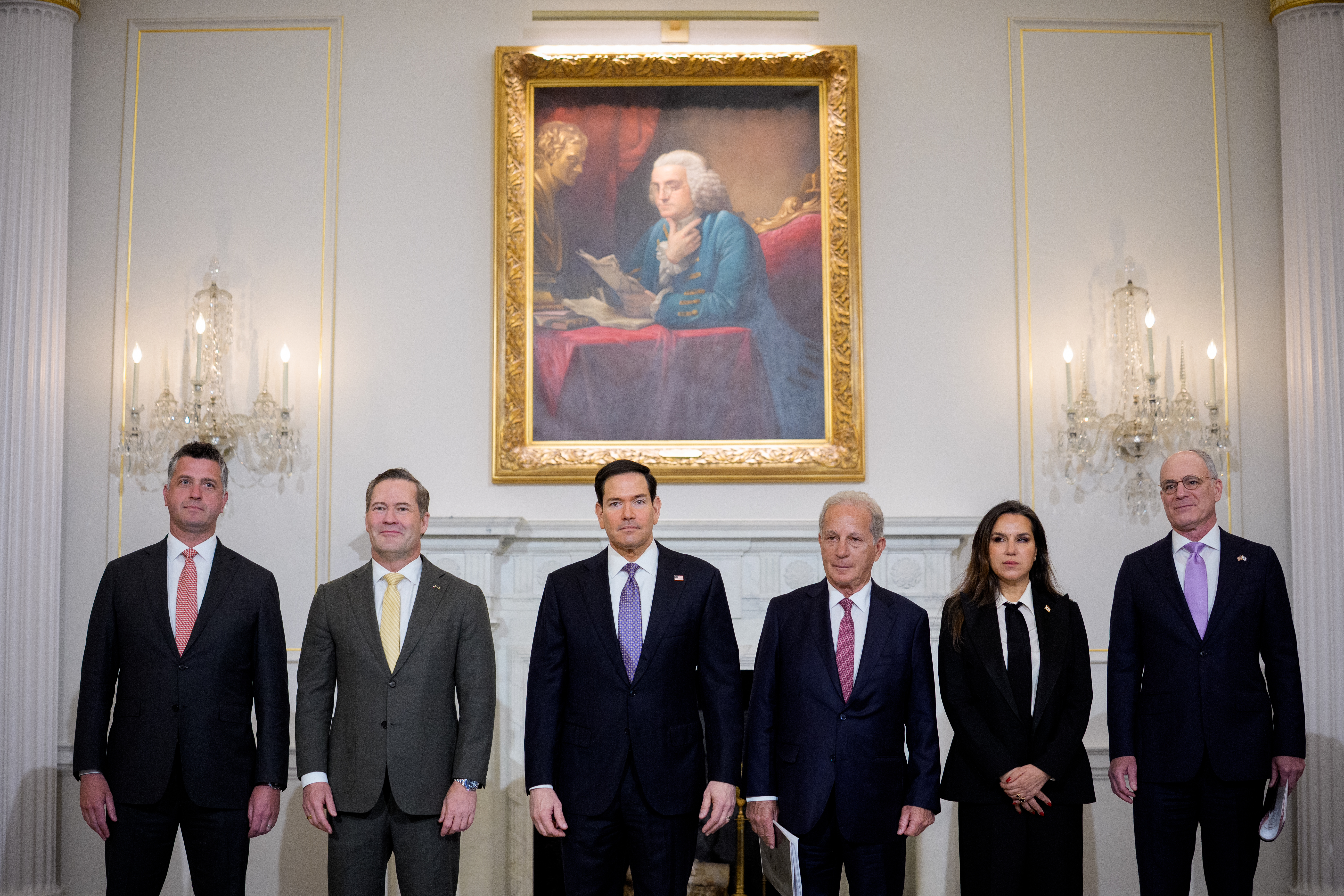 WASHINGTON, DC - APRIL 14: (L-R) Counselor of U.S. State Department Michael Needham, U.S. Ambassador to the United Nations Michael Waltz, U.S. Secretary of State Marco Rubio, U.S. Ambassador to Lebanon Michel Issa, Lebanese Ambassador to the U.S. Nada Hamadeh Moawad and Israeli Ambassador to the U.S. Yechiel Leiter pose for photos before beginning working-level peace talks at the U.S. State Department on April 14, 2026 in Washington, DC. In their first direct diplomatic talks in more than 30 years, Lebanon and Israel are preparing negotiations to potentially end Israel's conflict with the Lebanese militia Hezbollah. (Photo by Andrew Harnik/Getty Images)