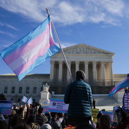 WASHINGTON, DC - JANUARY 13: Protesters supporting transgender athletes competing in women's sports gather outside the Supreme Court on January 13, 2026 in Washington, DC. Groups from both sides of the debate gathered on Tuesday morning to protest while two cases that prohibit transgender girls from joining girls' and women's sports teams are heard inside the Supreme Court. (Photo by Heather Diehl/Getty Images)