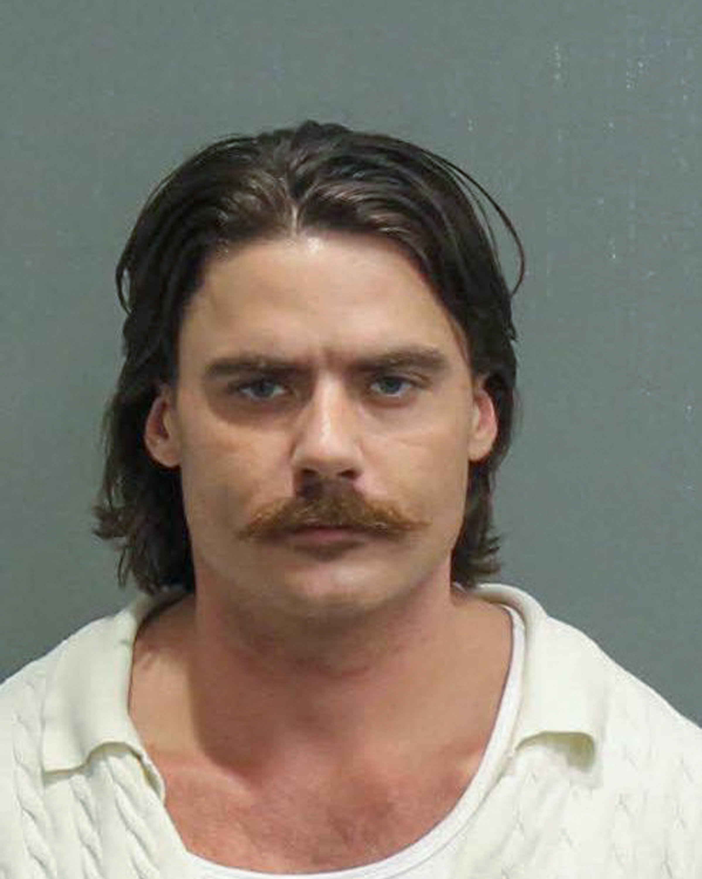 NASHVILLE, TN - MAY 9: (EDITOR'S NOTE: This handout image was provided by a third-party organization and may not adhere to Getty Images' editorial policy.) In this handout photo provided by the Metropolitan Nashville Police Department, Dalton Eatherly poses for a police booking photo on May 9, 2026 in Nashville, Tennessee. Eatherly, referred to as 'Chud the Builder,' known for rage-bait videos, was arrested in Nashville and charged with theft of services, disorderly conduct, and resisting arrest. (Photo by Metropolitan Nashville Police Department via Getty Images) FOR EDITORIAL USE ONLY