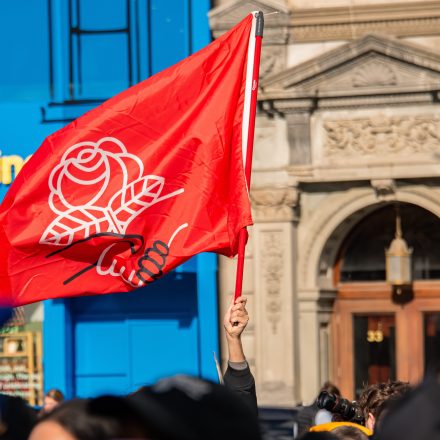 On November 16, 2025, in Manhattan, NYC, the New York Democratic Socialists of America hold the Tax the Rich rally. The group, along with other gathered protestors, speaks to ensuring newly elected mayor Zohran Mamdani's mandates. Throughout, speakers and protestors alike repeatedly call for leaders to tax the rich. (Photo by Neil Constantine/NurPhoto via AP)