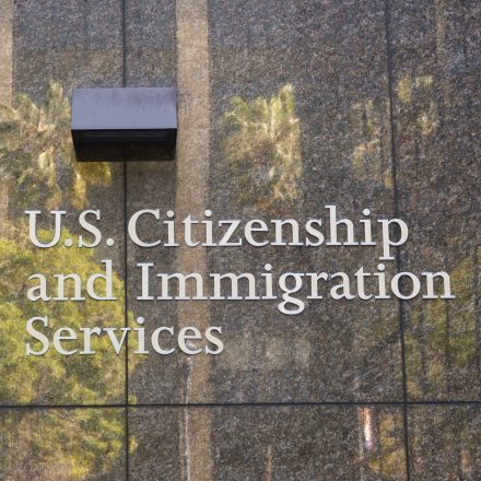 SAN DIEGO, CALIFORNIA - JANUARY 16: The U.S. Department Of Homeland Security logo is displayed at a Citizenship and Immigration Services office on January 16, 2026 in San Diego, CA. (Photo by Kevin Carter/Getty Images)