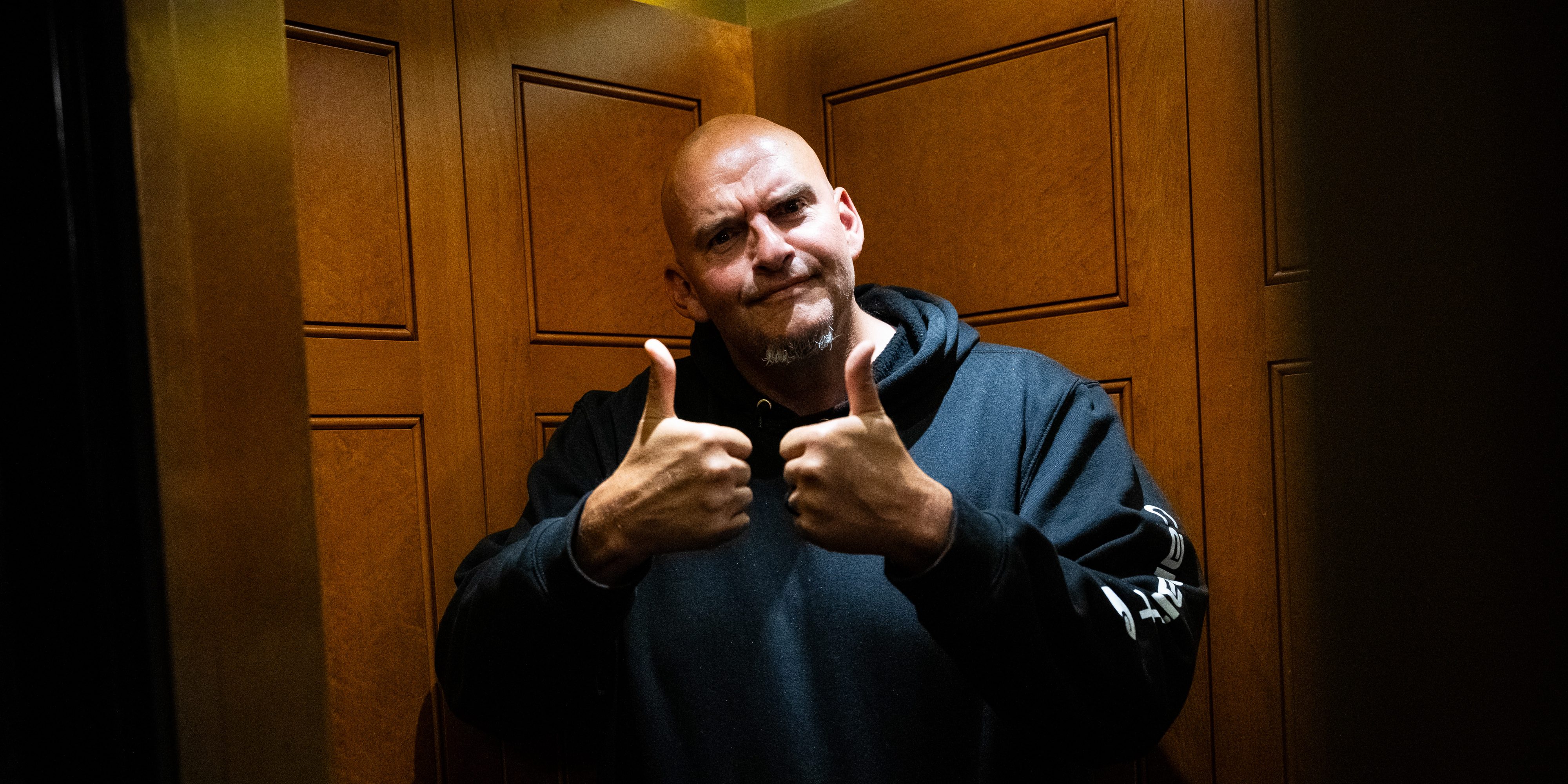 Senator John Fetterman, a Democrat from Pennsylvania, gives thumbs up in an elevator while departing a Senate vote at the US Capitol in Washington, DC, US, on Monday, June 15, 2026. The Senate will vote on an updated version of a bipartisan affordable housing legislative package this week, according to Senate aides, marking the latest step after months of negotiations as lawmakers in the House and Senate pushed competing versions of the bill. Photographer: Graeme Sloan/Bloomberg via Getty Images
