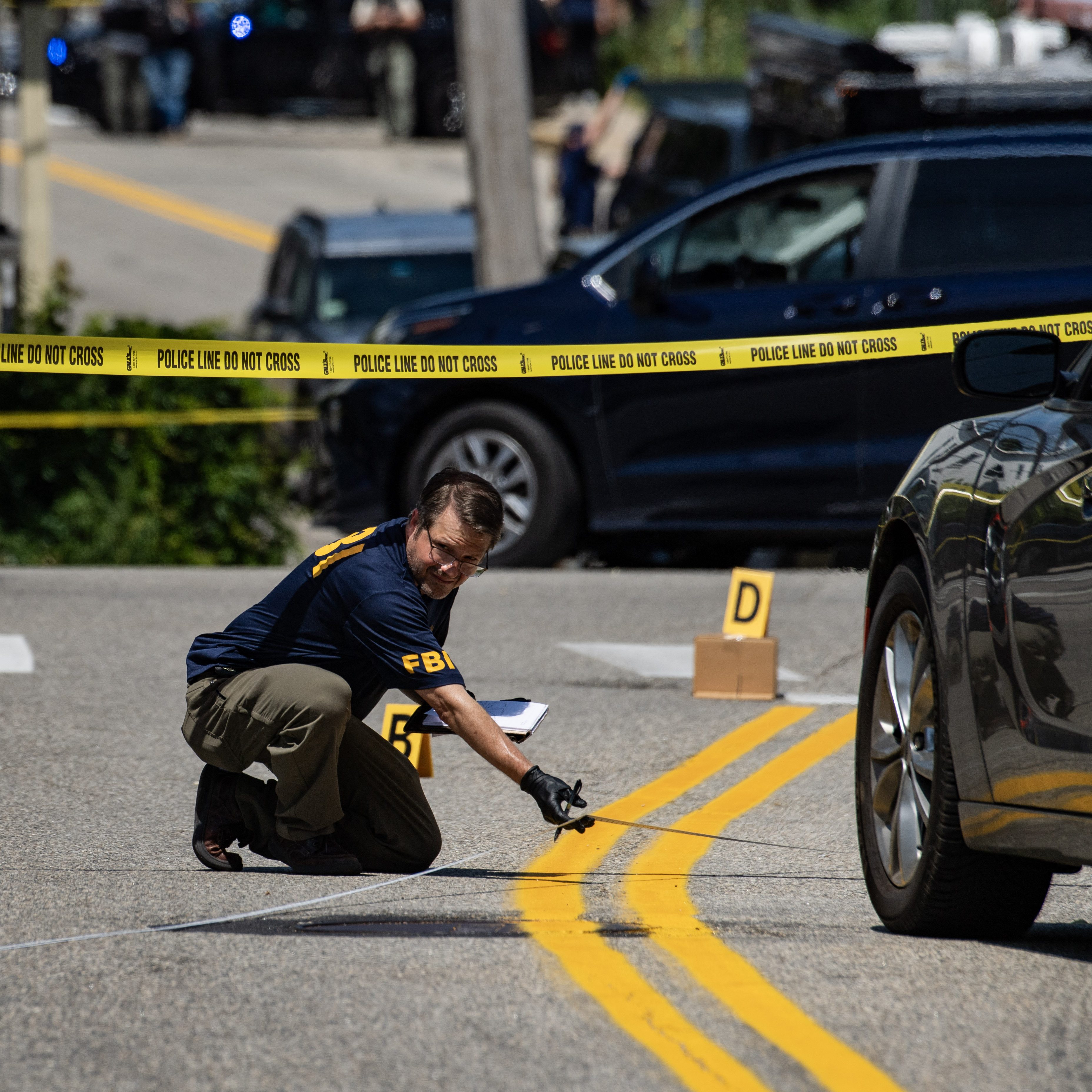FBI investigators work the scene of an alleged ICE involved shooting in Biddeford, Maine, on July 13, 2026. A person was killed Monday in a shooting involving Immigration and Customs Enforcement (ICE) agents in the northern US state of Maine, an official said.  The incident comes after an ICE agent last week shot dead a Mexican man during an operation in Houston, Texas. Authorities alleged that he tried to run over a federal officer, a claim denied by witnesses. (Photo by Joseph Prezioso / AFP via Getty Images)