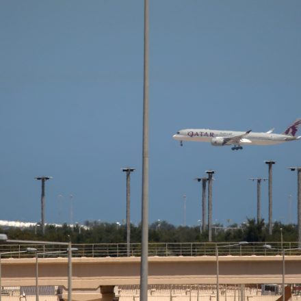 22 March 2026, Qatar, Doha: A Qatar Airways passenger plane lands at Hamad International Airport in Doha, after their flights were suspended due to the US-Israeli-Iranian conflict. Photo: Stringer/dpa (Photo by Stringer/picture alliance via Getty Images)