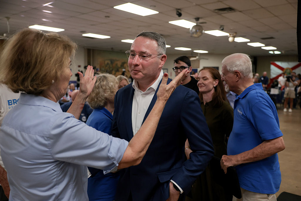   Florida Democratic U.S. Senate candidate, retired Army Lt. Col. Alex Vindman, receives well-wishes from supporters while leaving a primary election-night watch party after conceding to his opponent, Florida State Rep. Angie Nixon at an election-night watch party at the American Legion Post 222 event hall , on August 18, 2026, in Oakland Park, Florida. Nixon faces incumbent Sen. Ashley Moody (R-FL), who won the Republican primary tonight as well, in the November 3 general election. (Photo by Joe Raedle/Getty Images)