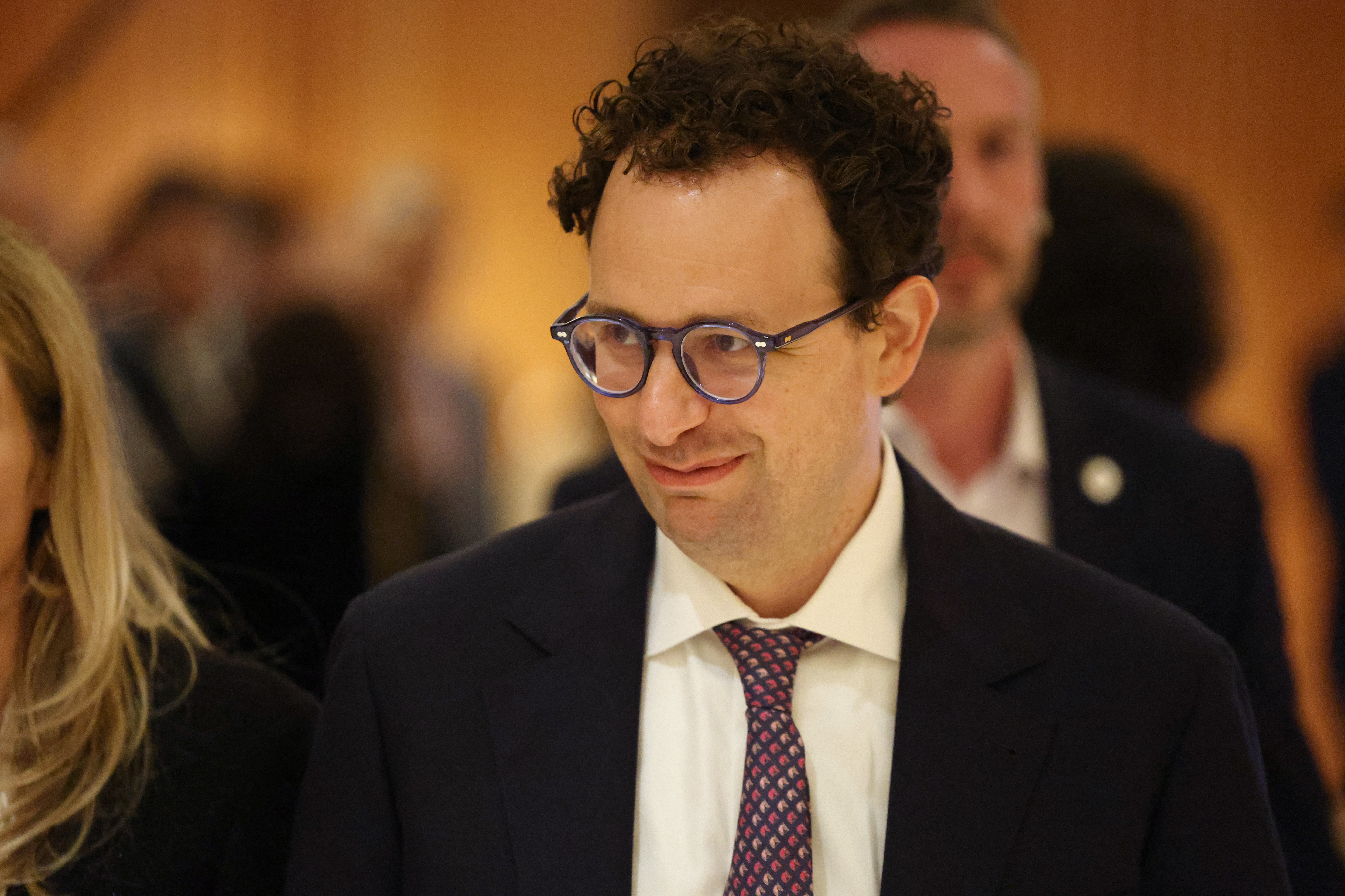 Anthropic CEO Dario Amodei looks on after a meeting with French President Emmanuel Macron during the AI Impact Summit in New Delhi on February 19, 2026. (Photo by Ludovic MARIN / AFP via Getty Images)