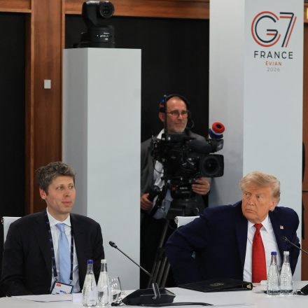 US President Donald Trump (C) takes a seat as he arrives next to Open AI CEO Sam Altman (L) and CEO of Google DeepMind Demis Hassabis for working lunch meeting of G7 members, partner countries, and artificial intelligence business leaders as part of the G7 summit, in Evian, eastern France, on June 17, 2026. A G7 summit is set to take place June 15 to 17 in the French town of Evian-les-Bains near Switzerland and it will be attended by country leaders as well as the EU's foreign policy chief and ministers from Brazil, Canada, the United Arab Emirates and Turkey. (Photo by Ludovic MARIN / AFP via Getty Images)