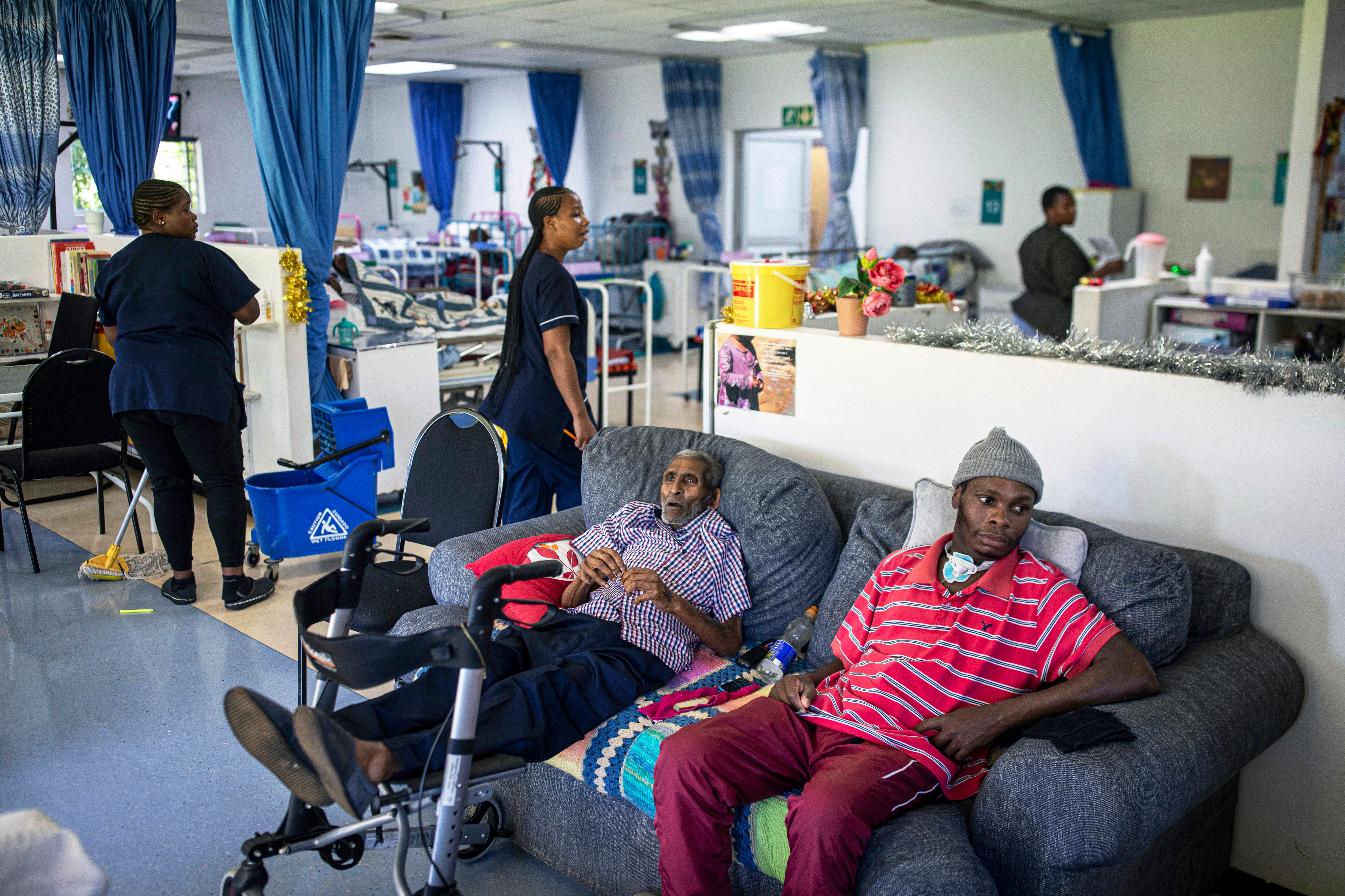 HILLCREST, SOUTH AFRICA NOVEMBER 29: Patients watch a soccer game on TV in the hospice at Hillcrest AIDS Centre on November 29, 2025 in Hillcrest outside Durban, South Africa. The organization, founded in 1990, runs multiple projects in rural areas, educating and counseling teenagers and grandmothers about HIV and Gender Based Violence. About 8 million people live with HIV in South Africa, the largest HIV epidemic in the world. The country is battling with funding due to Aid cuts from the U.S. and many organizations has cut down their projects or closed completely. (Photo by Per-Anders Pettersson/Getty Images)