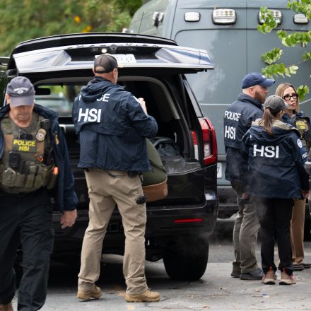 WASHINGTON, DC - OCTOBER 12: Homeland Security Investigations police search the home of Rep. Ilhan Omar (D-MN) on October 12, 2026 in Washington, DC. According to reports, the search is part of an ongoing criminal investigation. (Photo by Andrew Leyden/Getty Images)