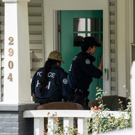 WASHINGTON, DC - OCTOBER 12: Homeland Security Investigations police search the home of Rep. Ilhan Omar (D-MN) on October 12, 2026 in Washington, DC. According to reports, the search is part of an ongoing criminal investigation. (Photo by Andrew Leyden/Getty Images)